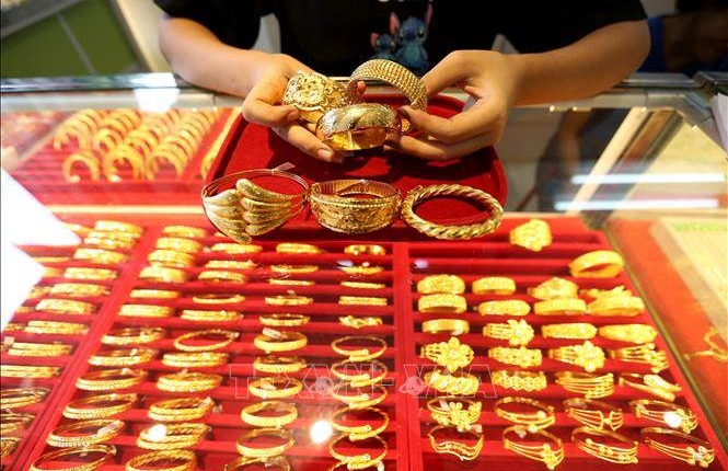 Đồng USD yếu nâng đỡ thị trường vàng châu Á