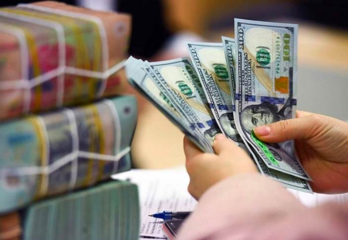 UOB dự báo khả năng VND tiếp tục suy yếu, tỷ giá ở mức 25.800 VND/USD trong quý II